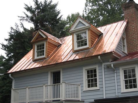 copper metal roof blue house|copper painted metal roofs.